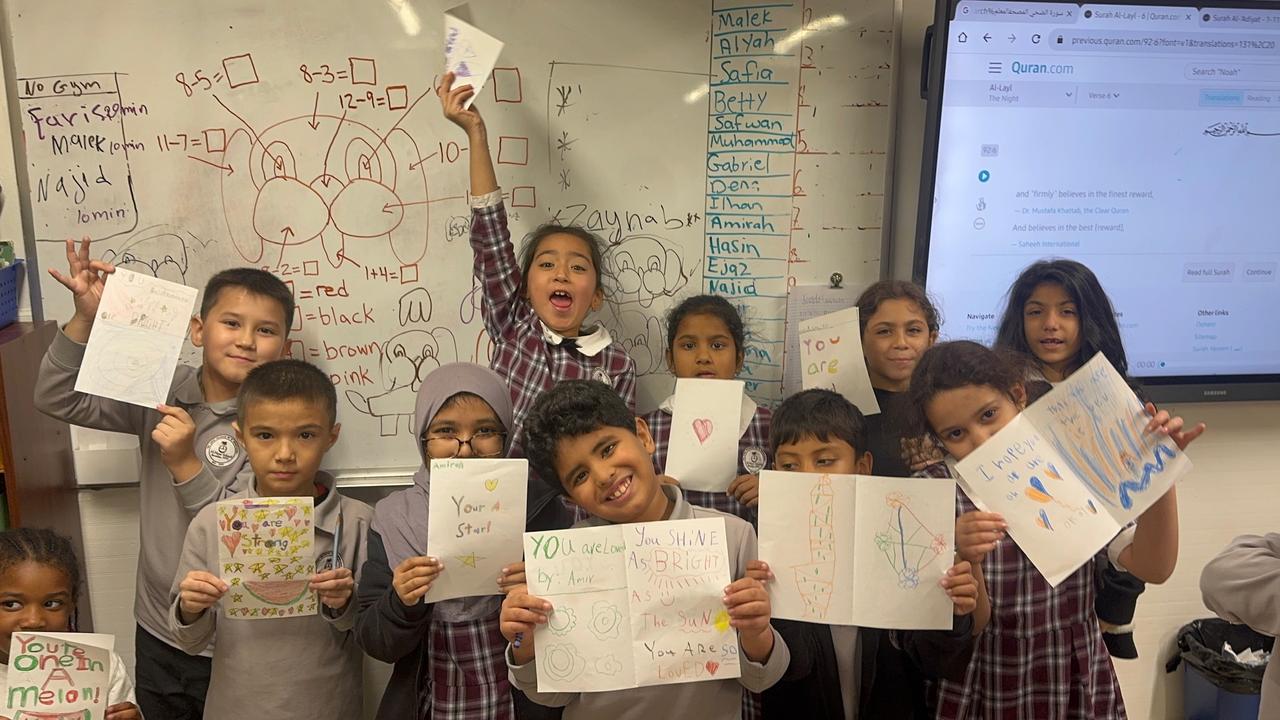 A classroom group sharing their completed support cards
