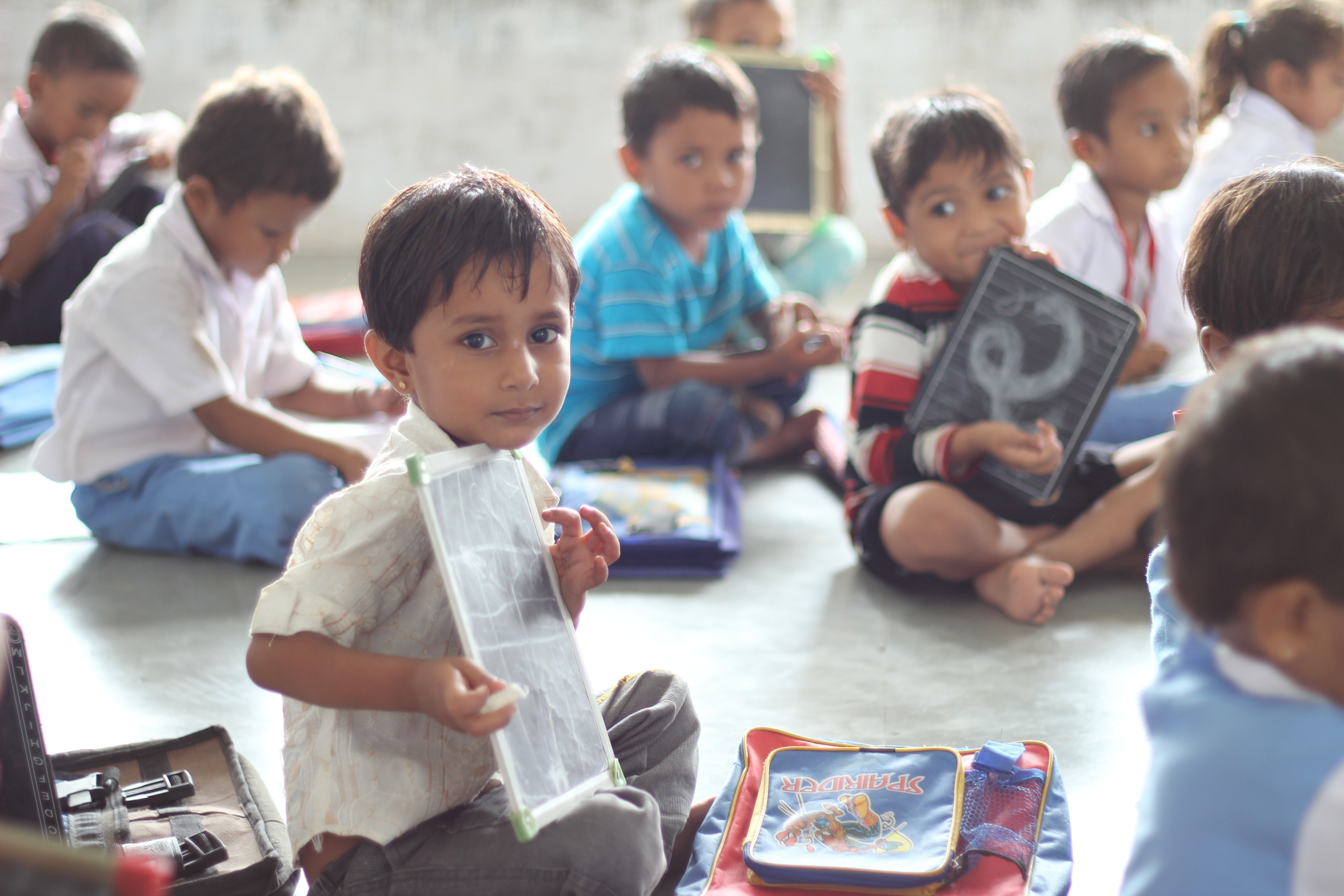 Children learning together in a classroom